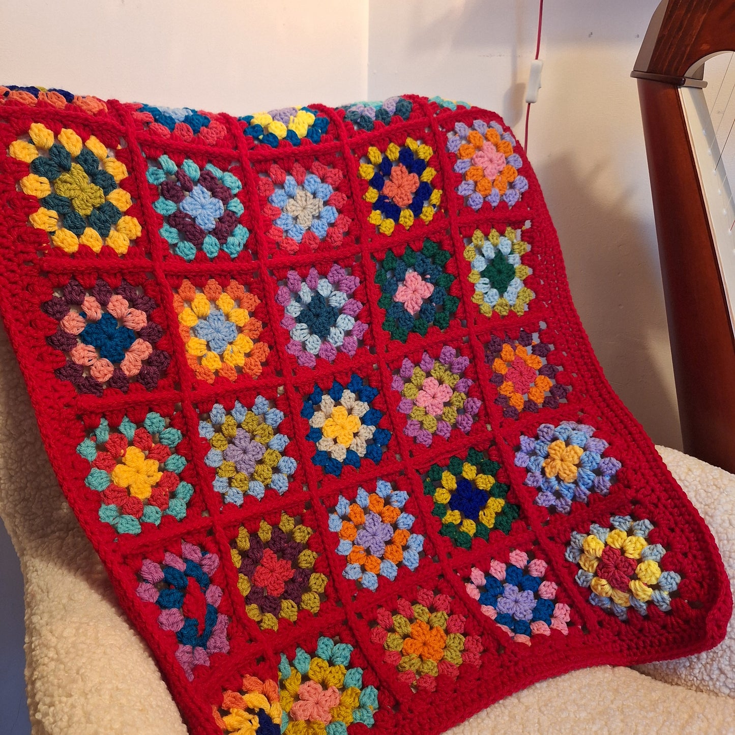 Chunky Patchwork Granny Square Lap Blanket with Red Border