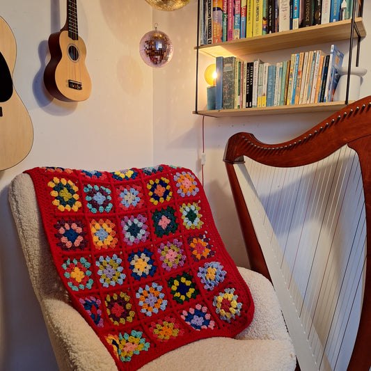 Chunky Patchwork Granny Square Lap Blanket with Red Border